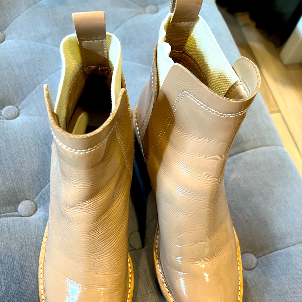 Cute Dolce Vita booties in a beautiful tan patent leather